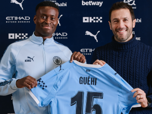 Manchester-City-firma-al-central-Marc-Guehi.png