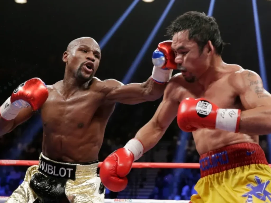 Mayweather-y-Pacquiao-chocaran-punos-en-Las-Vegas.png